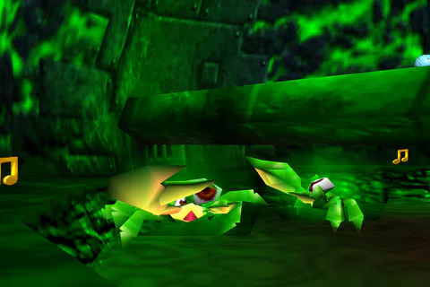 A Mutie Snippet holds up its enlarged claw near the chamber wall