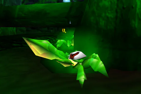 Close view of a Mutie Snippet’s enlarged eye and green legs