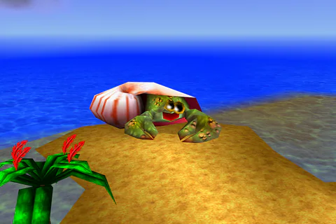 Nipper’s striped shell and green claws beside red flowers