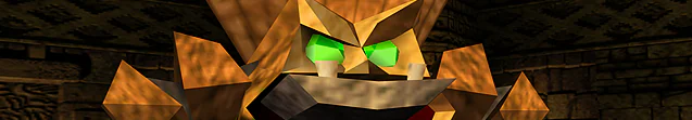 Targitzan’s stone face, green eyes and broad headdress