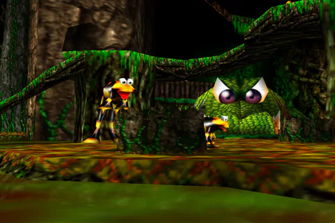 Yellow Flibbits leap near the giant crocodile-head landmark