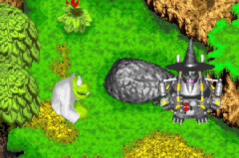 Klungo introducing the Mecha-Grunty suit beside the boulder in Spiral Mountain.