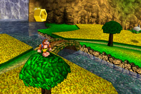Banjo jumping towards an Extra Honeycomb above a tree in Spiral Mountain.