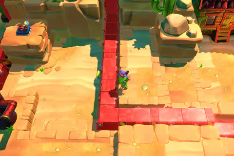 The duo explore red-brick paths and raised ledges around a Tonic in the desert overworld.