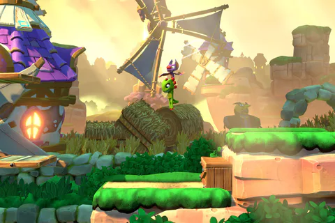 The duo leap across a gap beside a large windmill and cliffside platforms.