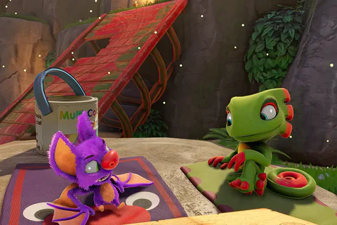 Yooka and Laylee relax on mats beside their ship in Shipwreck Creek.