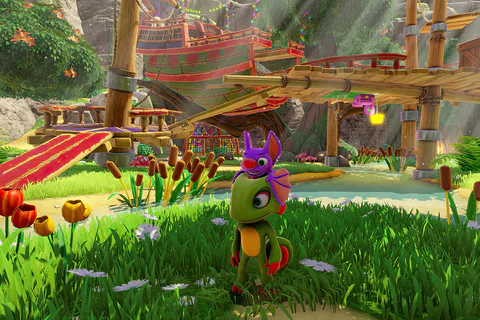 The duo stand in grass beside their ship’s red gangway in Shipwreck Creek.