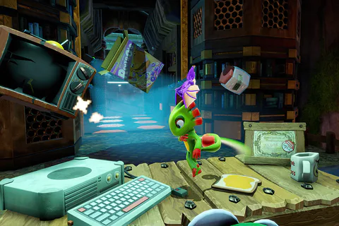 Yooka and Laylee face an open vault doorway in a computer-filled room of Hivory Towers.