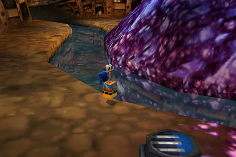 Detonator Banjo stands beside the stream and a purple ore mound in Glitter Gulch Mine.