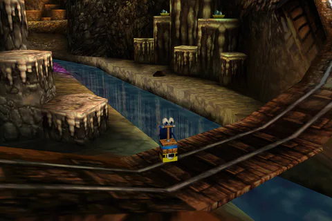 Detonator Banjo stands on the railway beside the stream and wooden platforms.