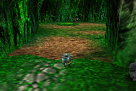 Stony Banjo stands on a path between green cliff walls.