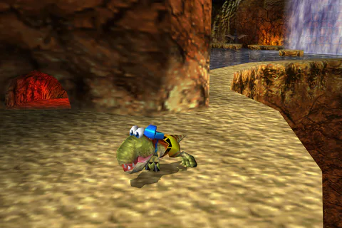 Baby T-Rex on the path beside the central mountain