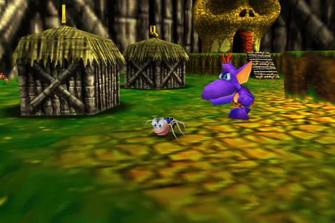 The Termite stands outside Mumbo’s Skull near a Grublin and the village huts.