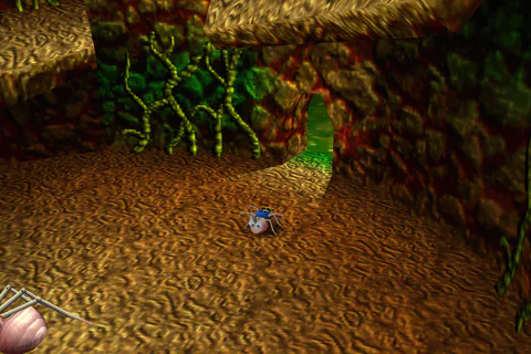 The Termite explores the earthen interior of Ticker’s Tower beneath a large web.