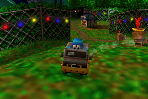 Van Banjo faces the camera beside the decorated fence and Big Top grounds.