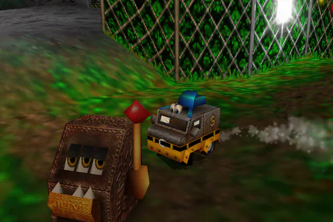 Van Banjo approaches a Fruity beside the fence around the Big Top.