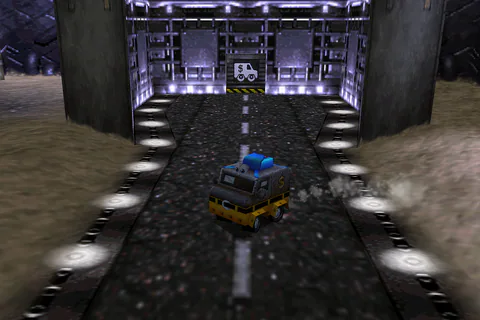 Van Banjo drives along Area 51’s runway toward a vehicle-marked door.